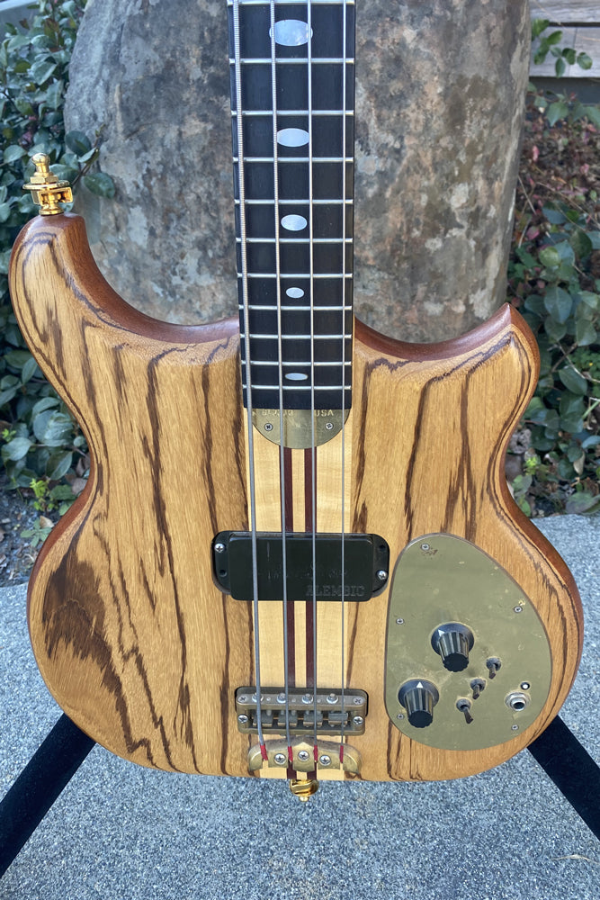 Pre owned bass guitars top